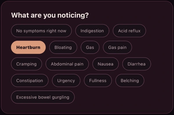 Digestion Signals symptom choices, including No symptoms right now, with Heartburn selected in this demonstration.